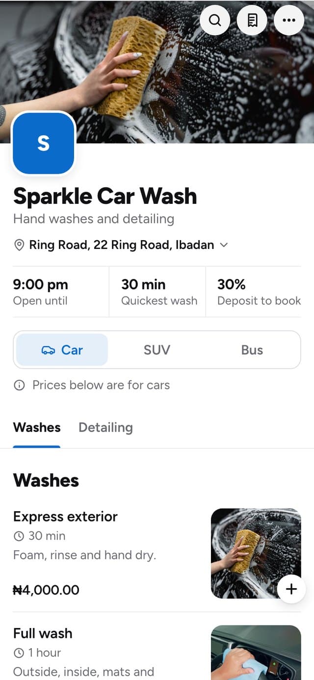A car wash's own booking link on a phone, with car, SUV and bus prices