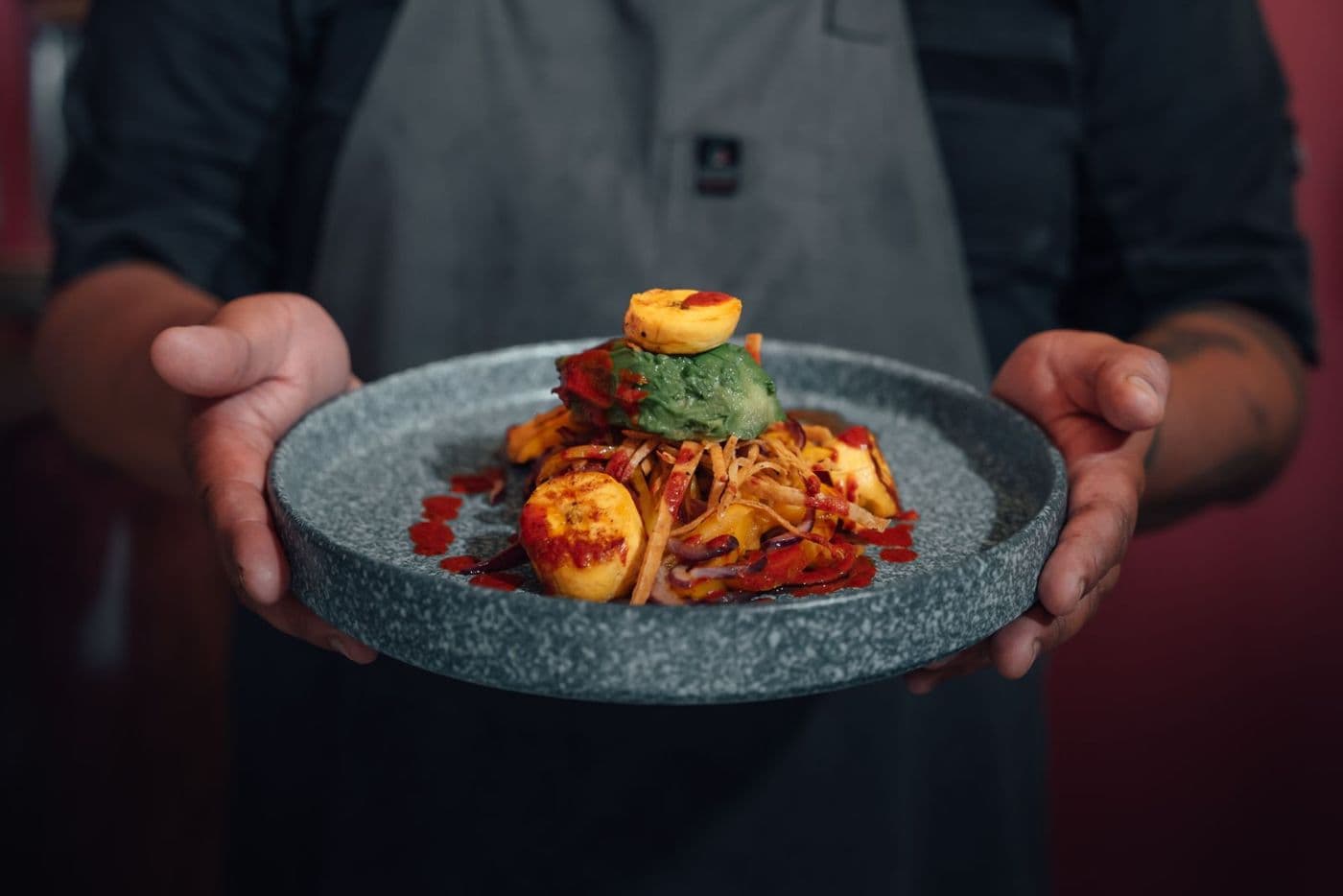 A plate of food held out to serve