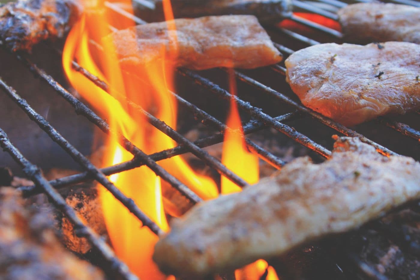 Chicken on a flaming grill